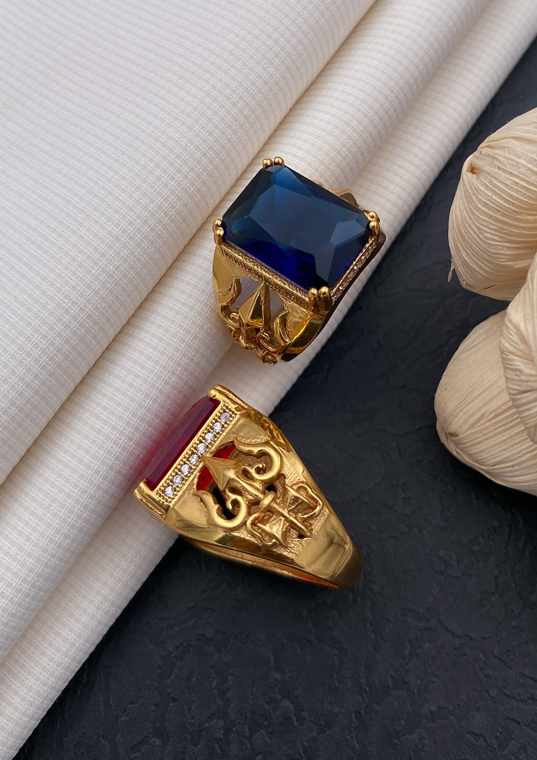 Mens gold ring on sale with blue stone