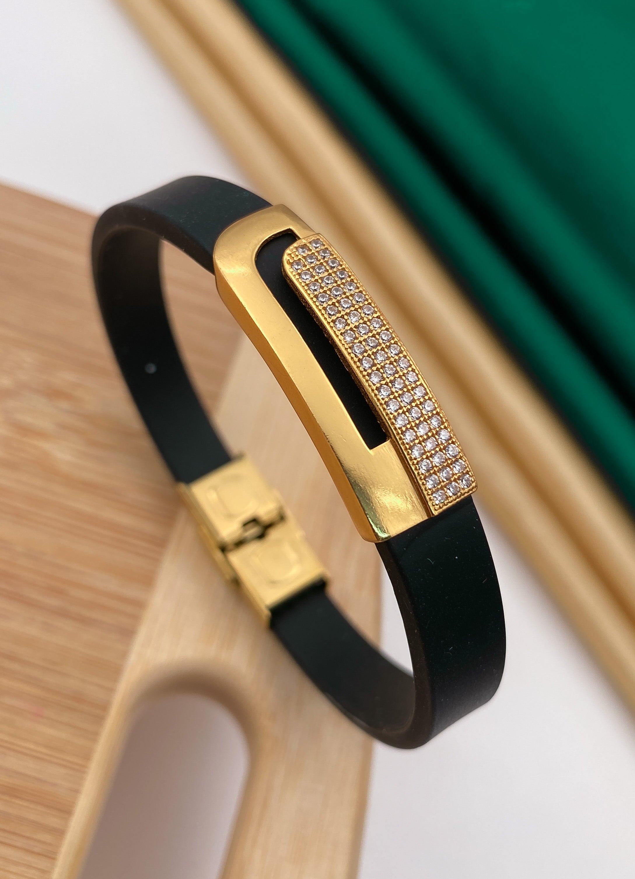 One side gold plated diamonds in black silicone bracelet for men